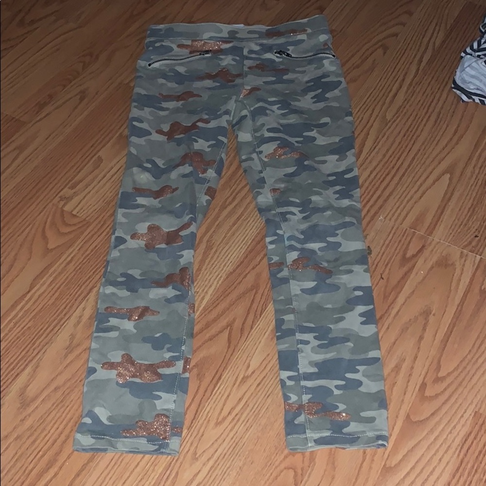 Children place sparkly camo jeggings